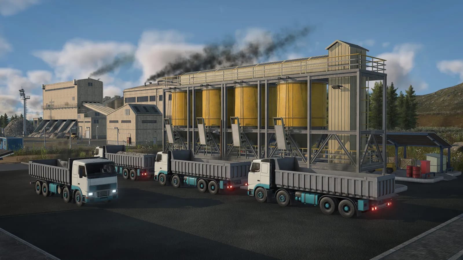Camiões a carregar numa fábrica de cimento